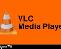 Interfaz principal del reproductor multimedia con fondo negro y logotipo de cono naranja en el centro.